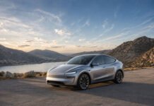 Tesla Model Y Juniper Review 2026: Worth the Upgrade? Tesla Model Y Juniper Review 2026 featured image showing redesigned Tesla electric SUV with scenic background